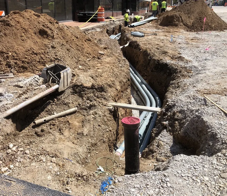 Water line work at the street — trench and mains
